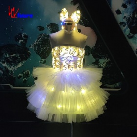 A luminous skirt with a bow headdress